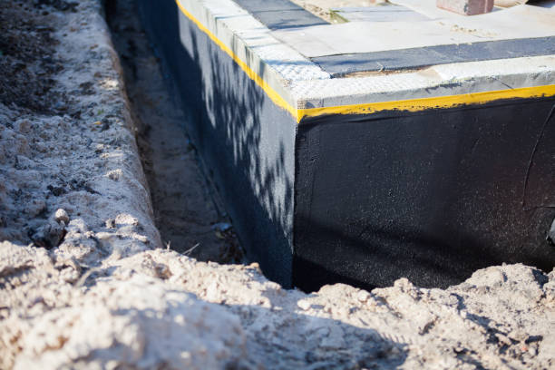 Professional Waterproofing technician working in Pittsboro, NC